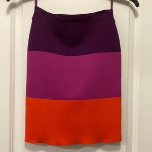 NWT BCBGMaxAzria color block bodycon mini skirt in Medium. Plum/fuschia/orange
